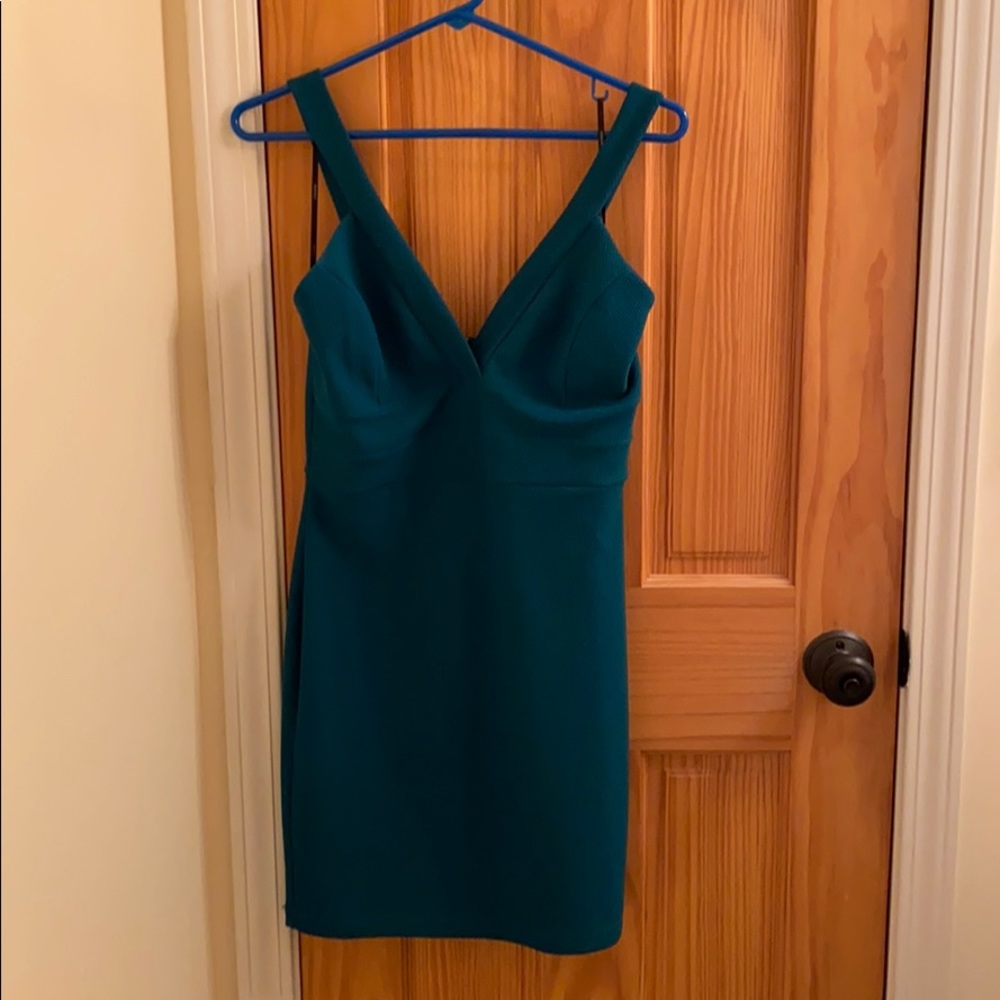 Emerald green midi dress plunging neckline
